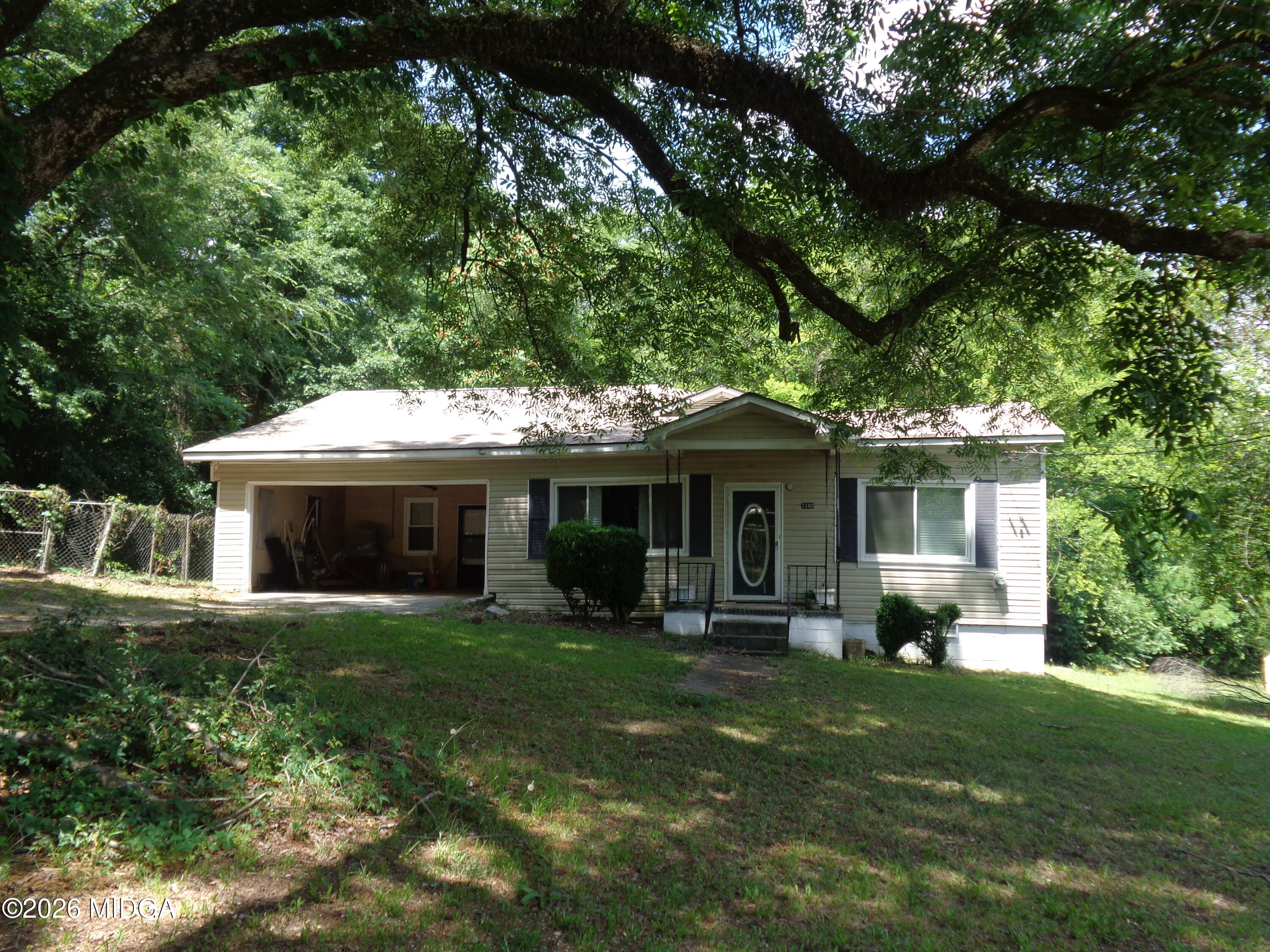 3380 Goodwin Lane Macon, GA 31217 - Photo 1 of 22 a front view of house with yard and green space