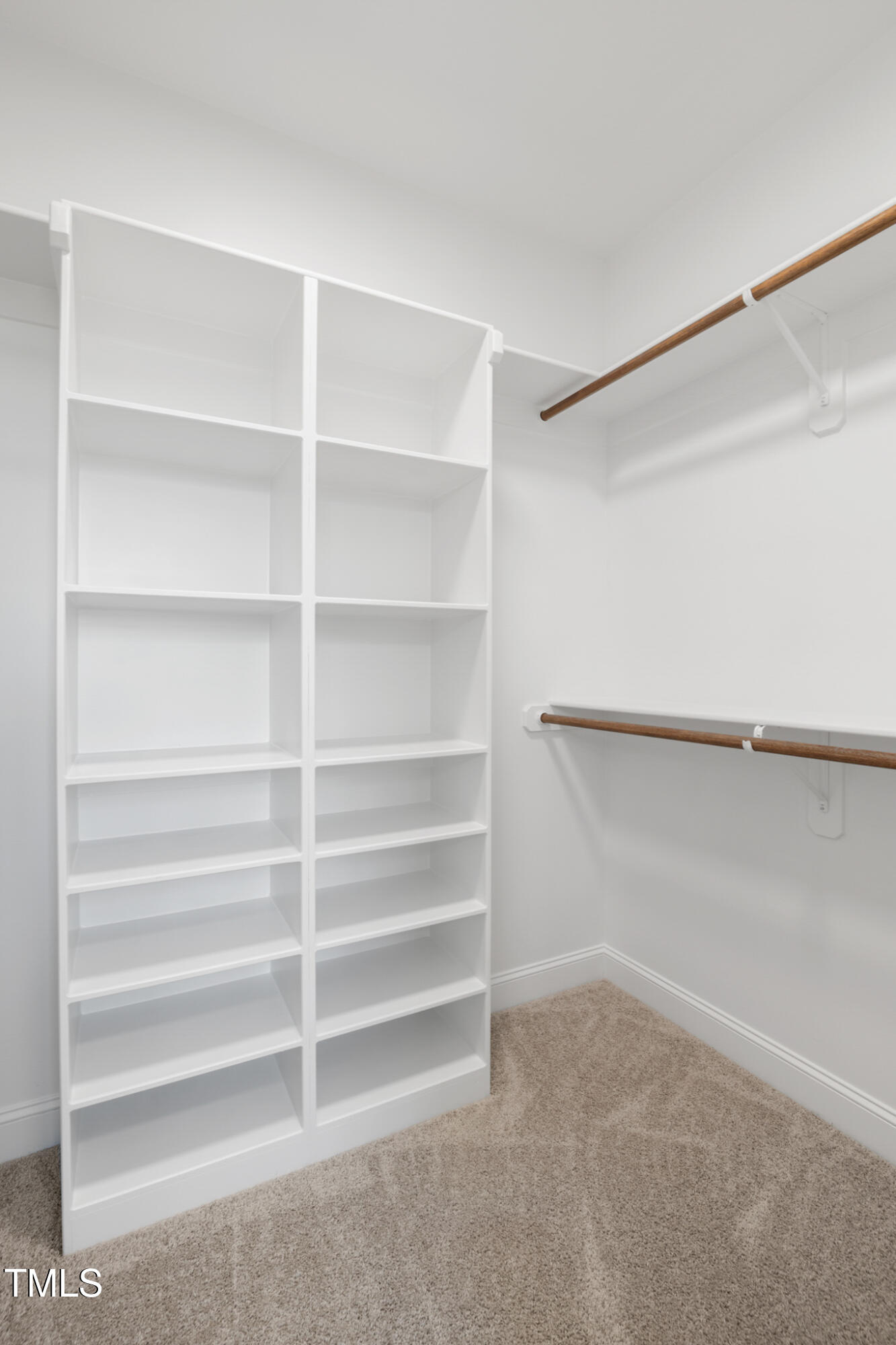 4948 Zebulon Road Zebulon, NC 27597 - Photo 17 of 35 a view of an empty walk in closet
