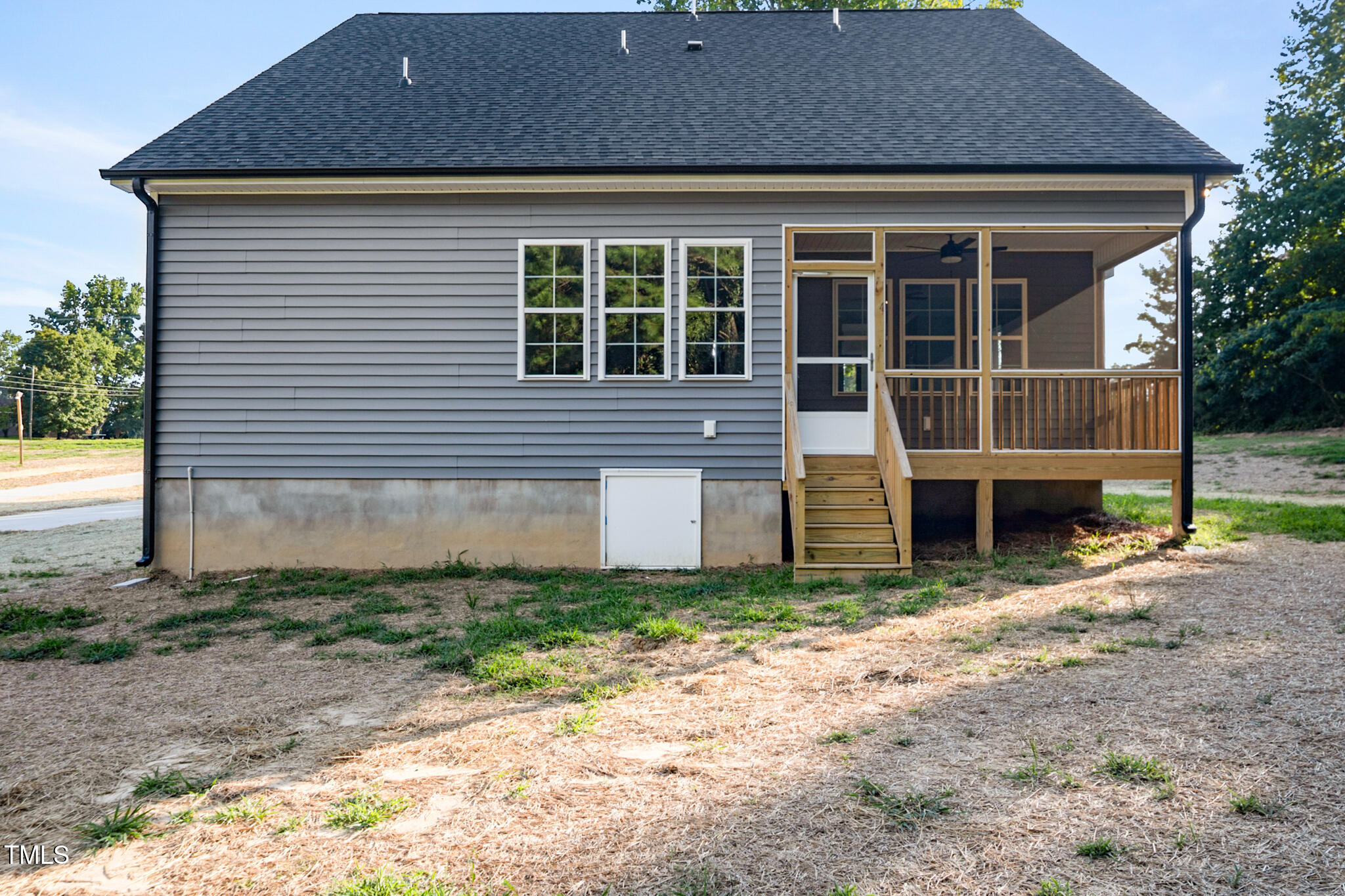 4948 Zebulon Road Zebulon, NC 27597 - Photo 31 of 35 a front view of a house with garden