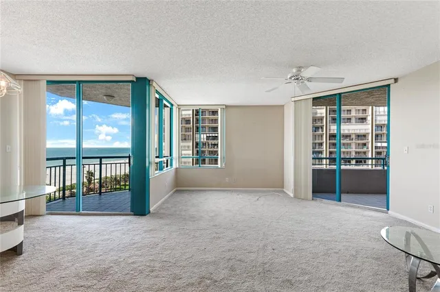 a view of an empty room with a window