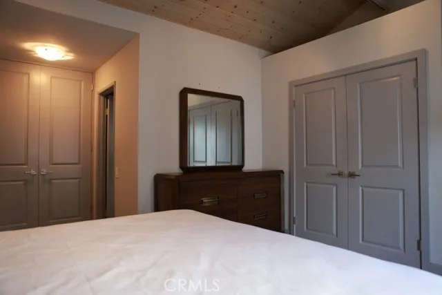 a bathroom with a sink a mirror and a shower