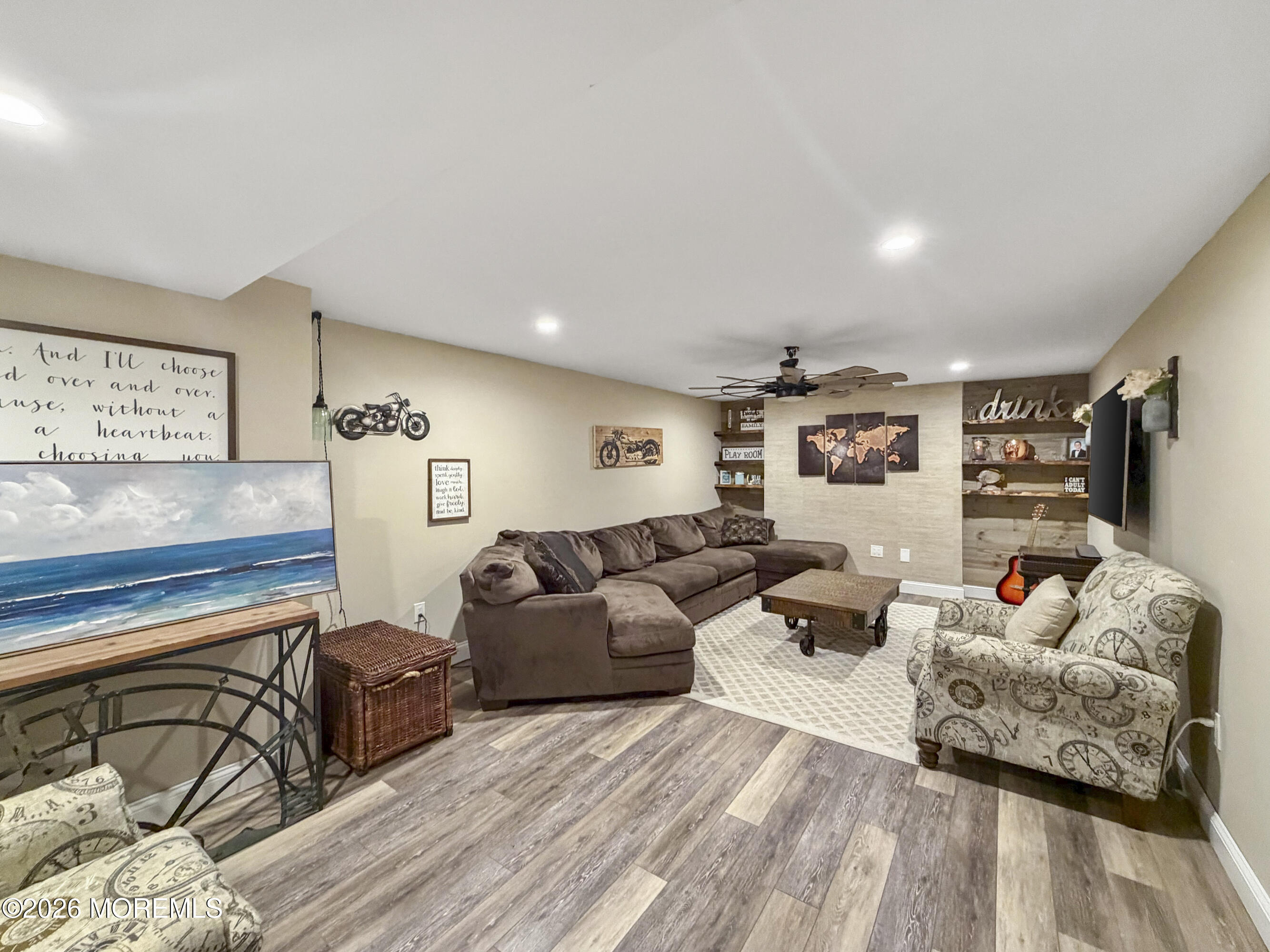 191 Summit Avenue Middletown, NJ 07718 - Photo 26 of 38 a living room with furniture and wooden floor