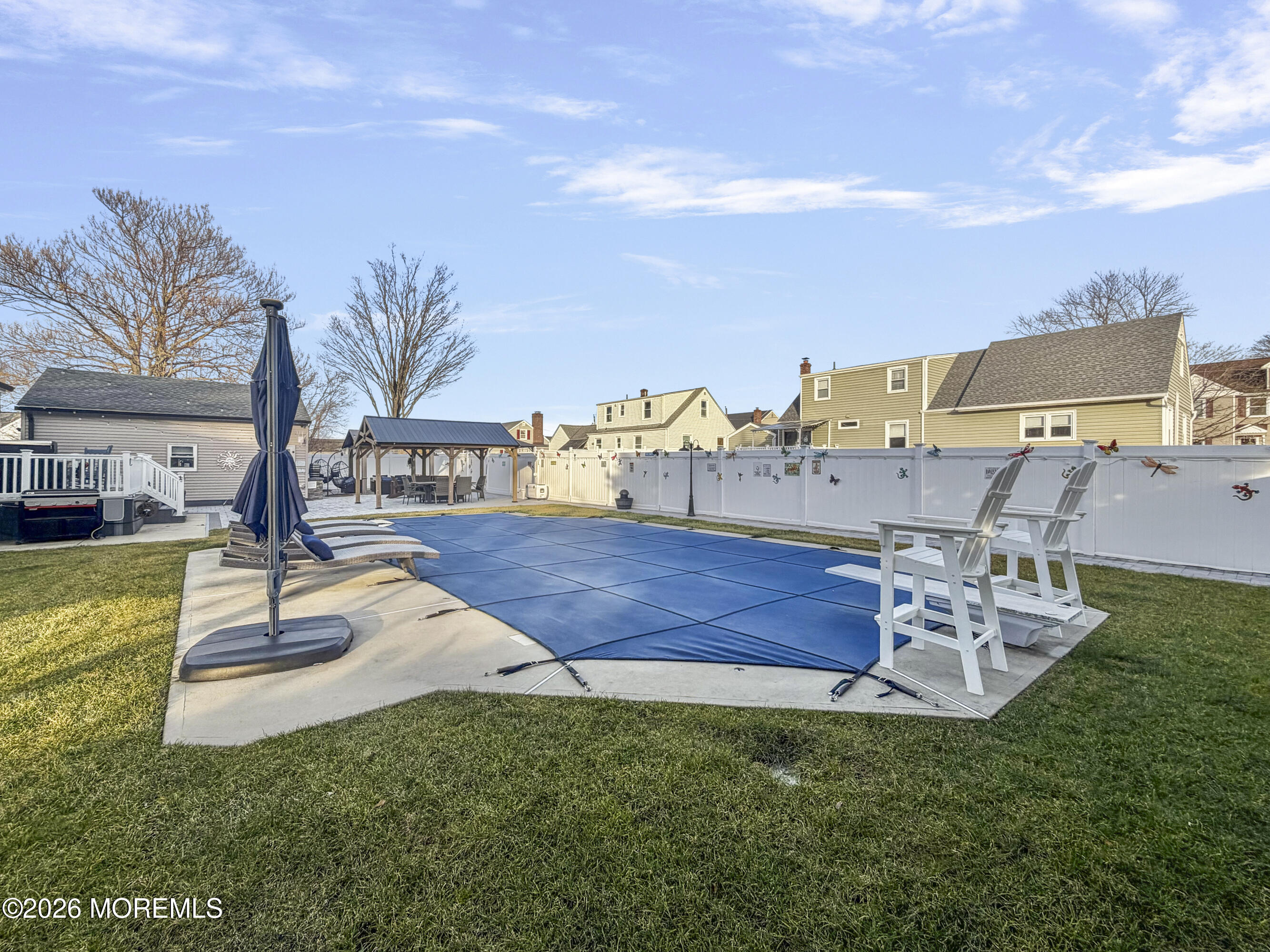 191 Summit Avenue Middletown, NJ 07718 - Photo 35 of 38 a view of a swimming pool with lounge chairs