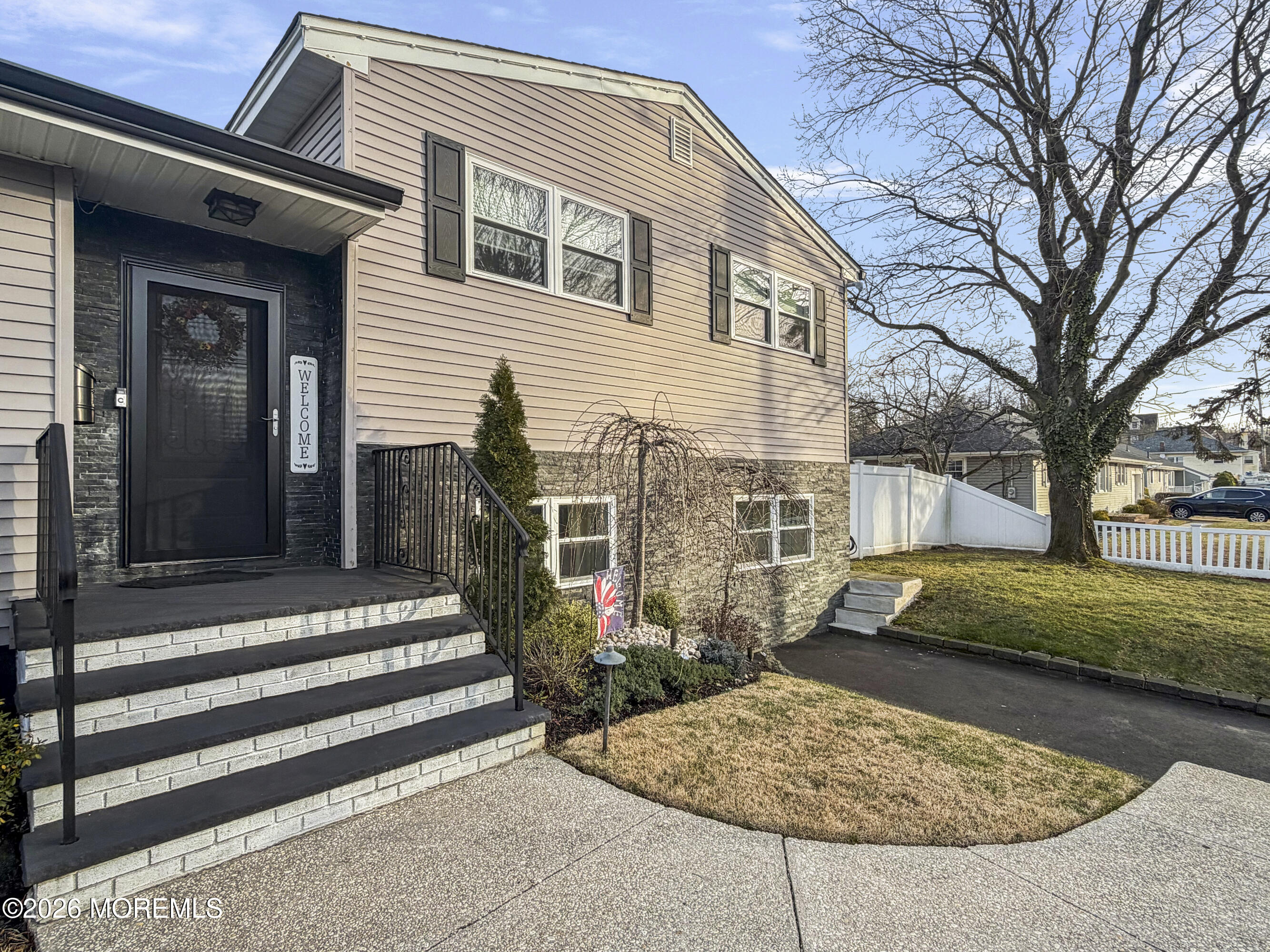 191 Summit Avenue Middletown, NJ 07718 - Photo 4 of 38 a view of a house with a yard