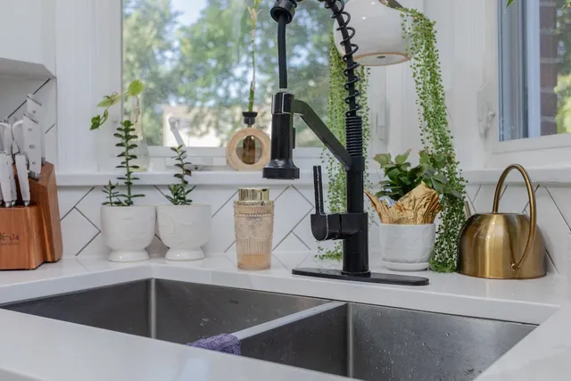 a dining room with furniture window and wooden floor
