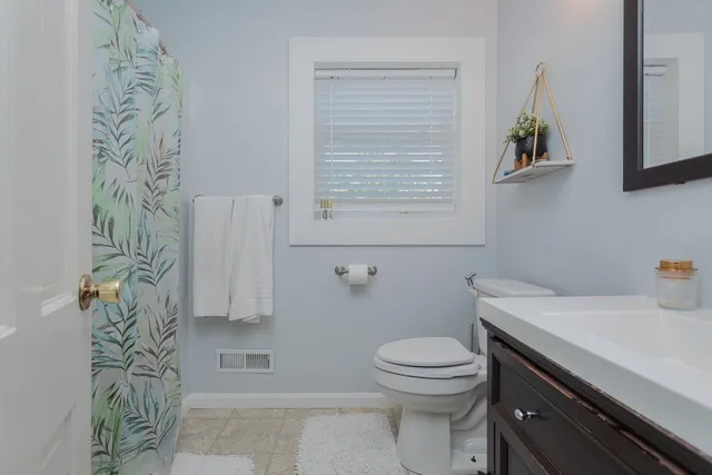 a house view with a garden space