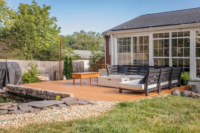 a kitchen with a stove top oven and cabinets