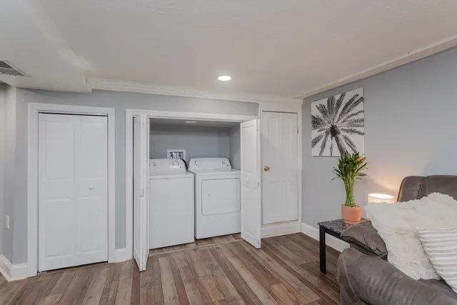 an aerial view of a house with a swimming pool