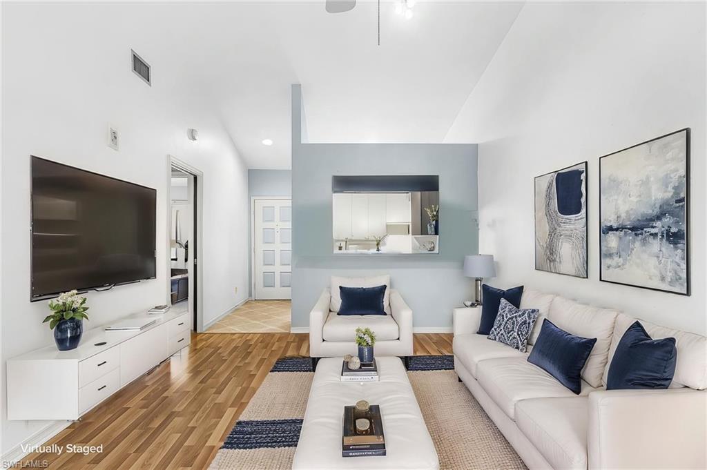5857 Rattlesnake Hamm Road, Unit 204 Naples, FL 34113 - Photo 1 of 32 Living Room, virtually staged