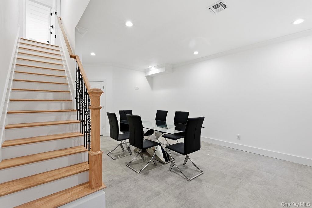 768 Bridgehampton Sag Harbor Westhampton Beach, NY 11978 - Photo 30 of 35 a workspace with furniture and stairs