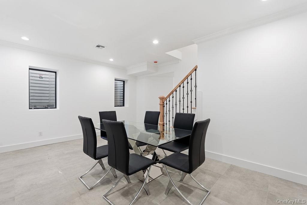 768 Bridgehampton Sag Harbor Westhampton Beach, NY 11978 - Photo 31 of 35 a view of a dining room with furniture