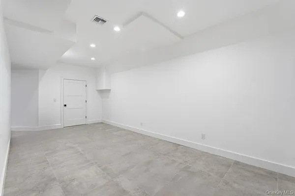 an empty room with an entryway