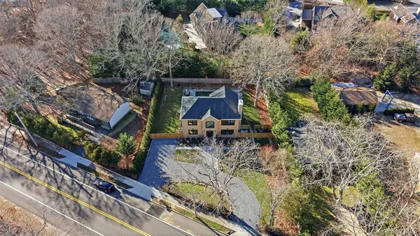 an aerial view of a house with outdoor space