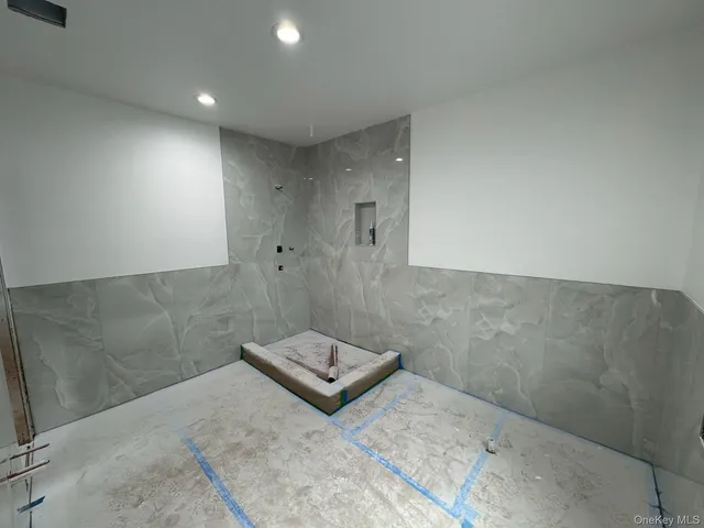 a view of a bathroom with shower