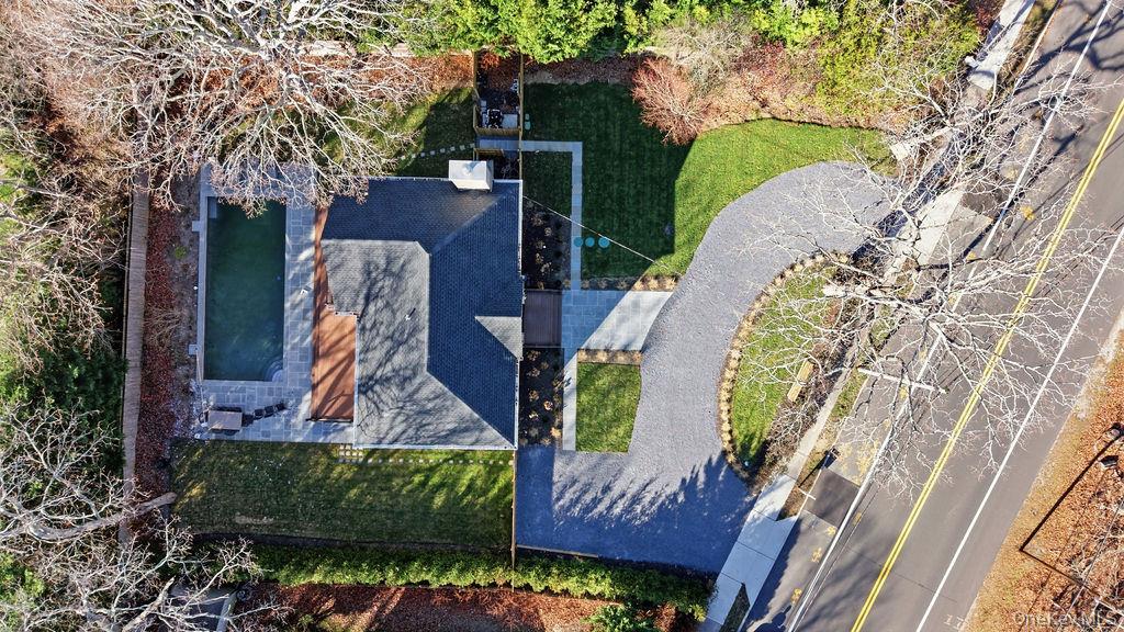 768 Bridgehampton Sag Harbor Westhampton Beach, NY 11978 - Photo 7 of 35 an aerial view of a house with a garden