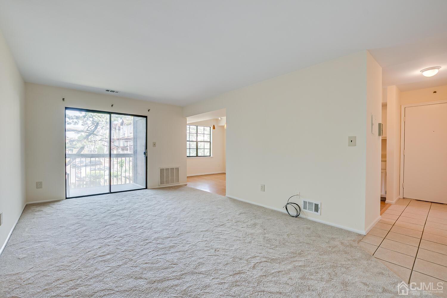 116 Keystone Court, Unit 1162 Woodbridge, NJ 07095 - Photo 15 of 28 an empty room with windows