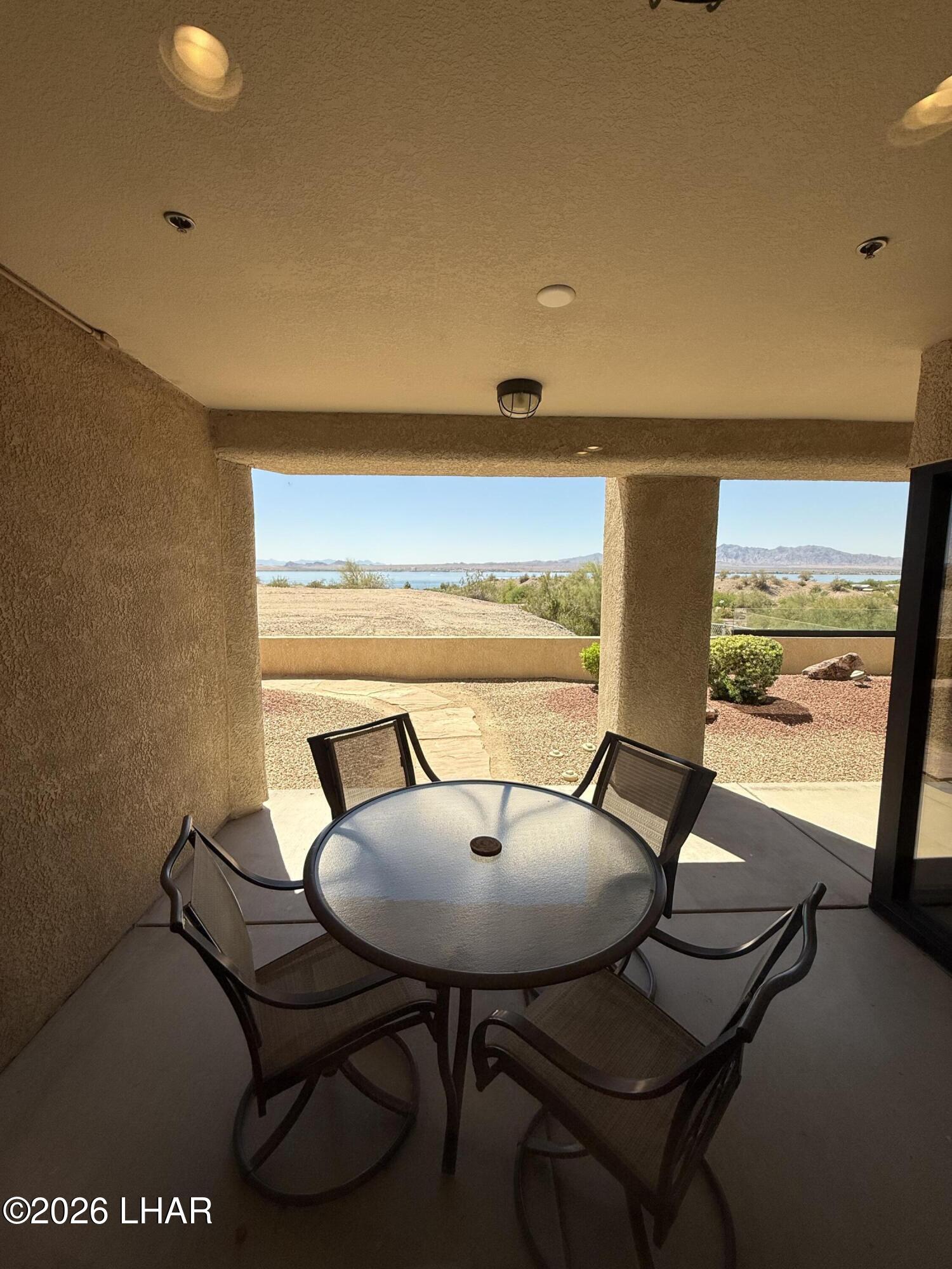 433 London Bridge Road, Unit B101 Lake Havasu City, AZ 86403 - Photo 23 of 35 a view of a dining room with furniture and window