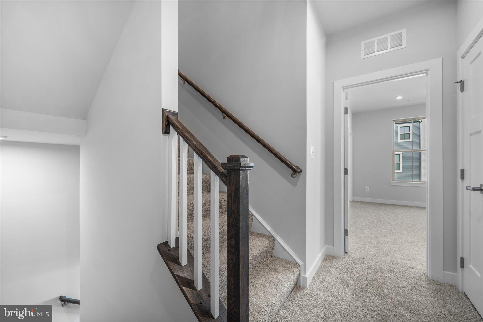 42530 Invergordon Terrace Sterling, VA 20166 - Photo 12 of 39 a view of a hallway with staircase