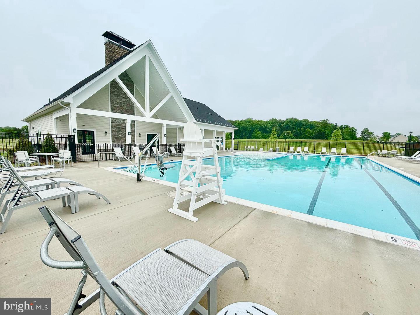 42530 Invergordon Terrace Sterling, VA 20166 - Photo 39 of 39 a view of a house with swimming pool and sitting area