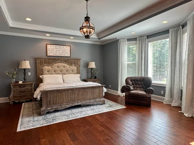 a living room with furniture a fireplace and window