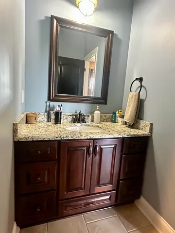 a view of room with window and furniture