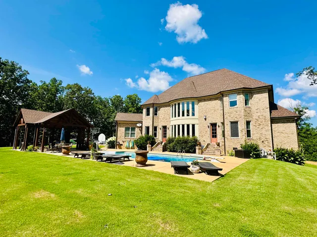 a building outdoor space with furniture and garden view