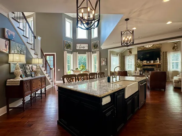 a view of a house with a yard porch and sitting area