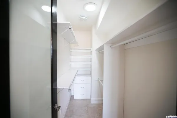 a view of entryway and hall with a window