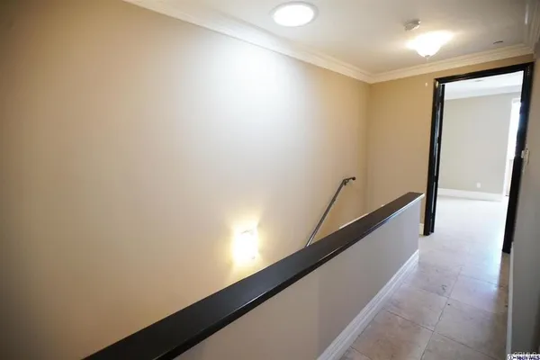 a view of hallway with stairs