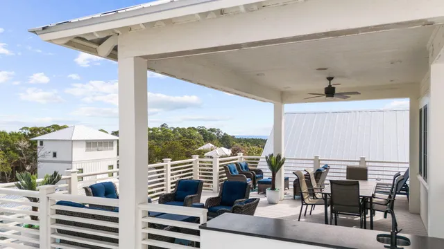 a view of a balcony with chairs