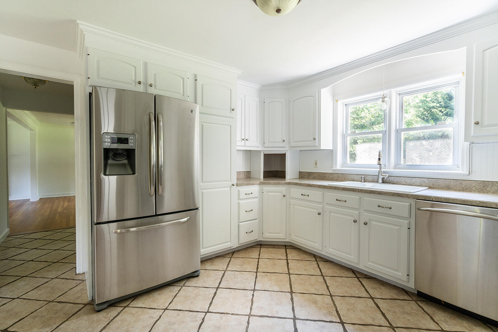 30 Parade Hill Road New Canaan, CT 06840 - Photo 6 of 12 a kitchen with granite countertop stainless steel appliances a refrigerator sink and cabinets