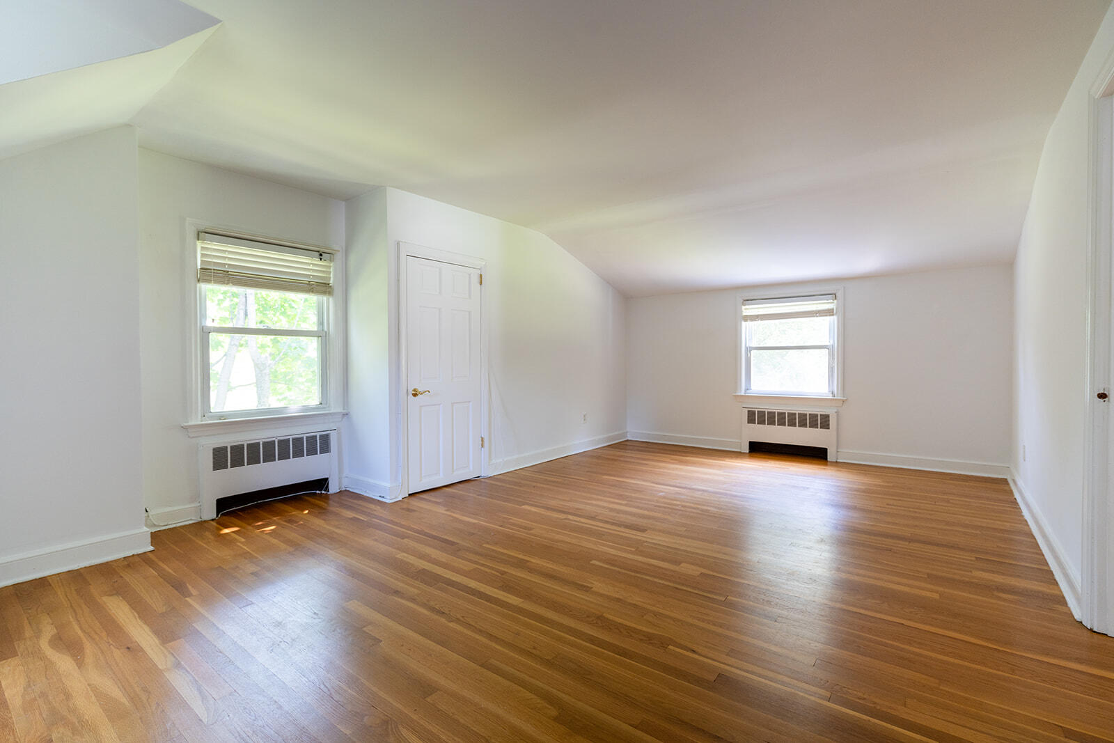 30 Parade Hill Road New Canaan, CT 06840 - Photo 10 of 12 an empty room with wooden floor and windows