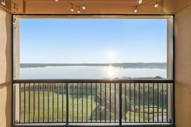 a view of balcony with furniture