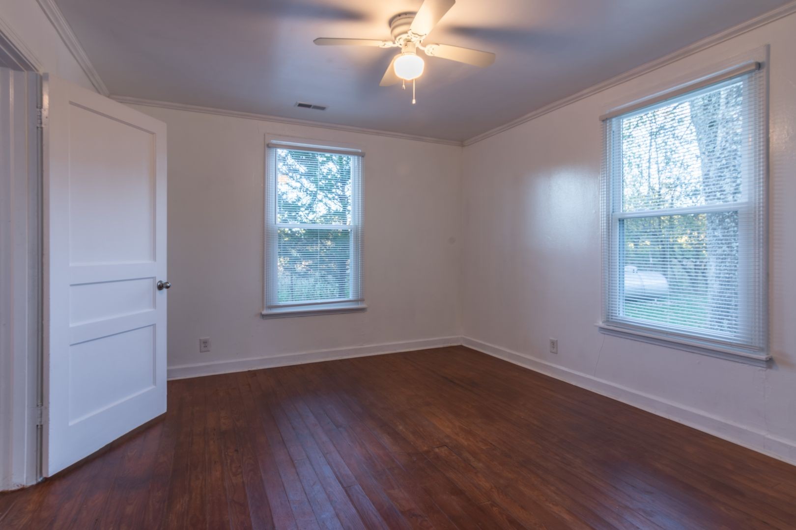 1809 Cairo Bend Road Lebanon, TN 37087 - Photo 13 of 17 a view of an empty room with wooden floor and a window