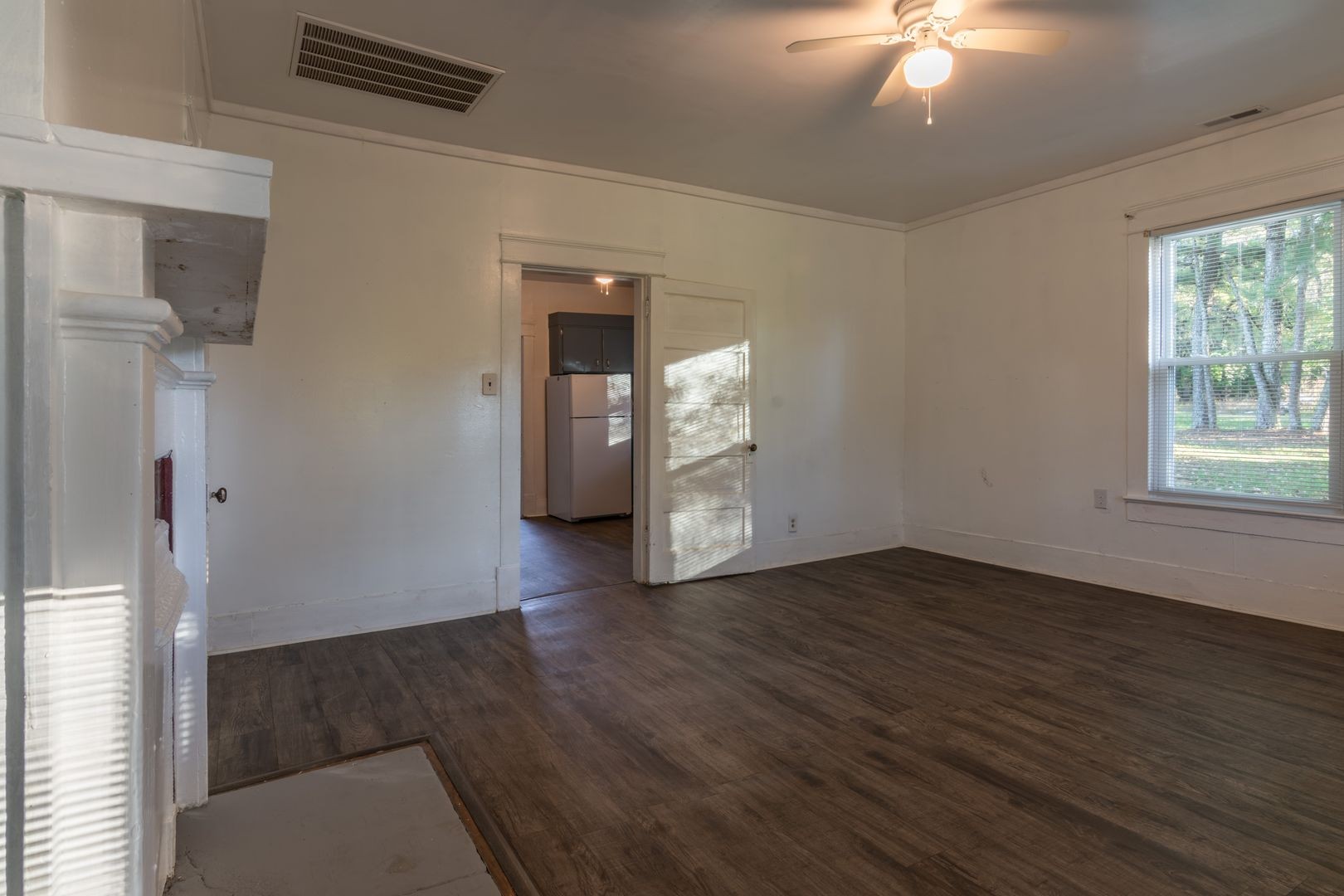 1809 Cairo Bend Road Lebanon, TN 37087 - Photo 14 of 17 wooden floor in an empty room with a window