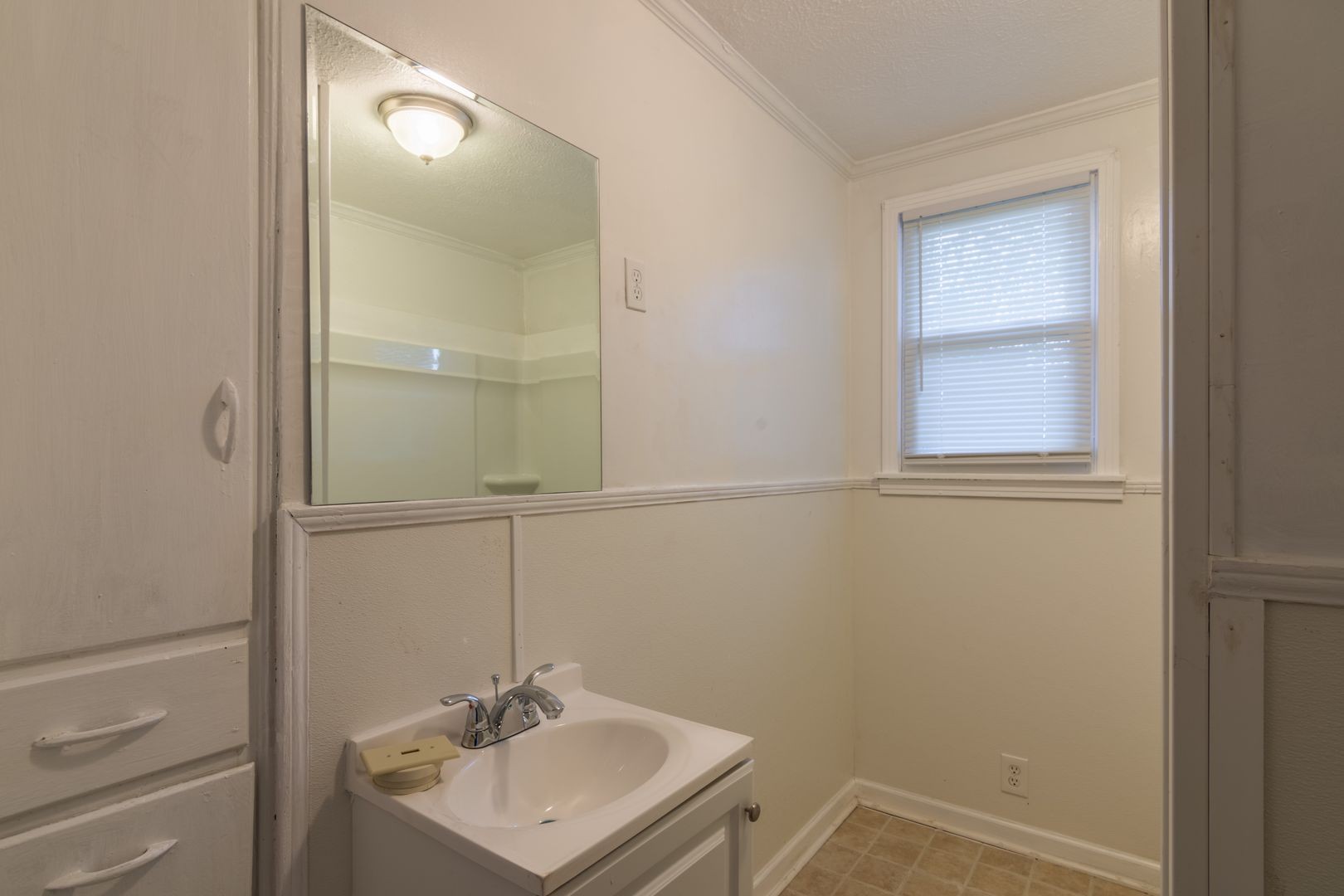 1809 Cairo Bend Road Lebanon, TN 37087 - Photo 15 of 17 a bathroom with a sink a vanity and a mirror
