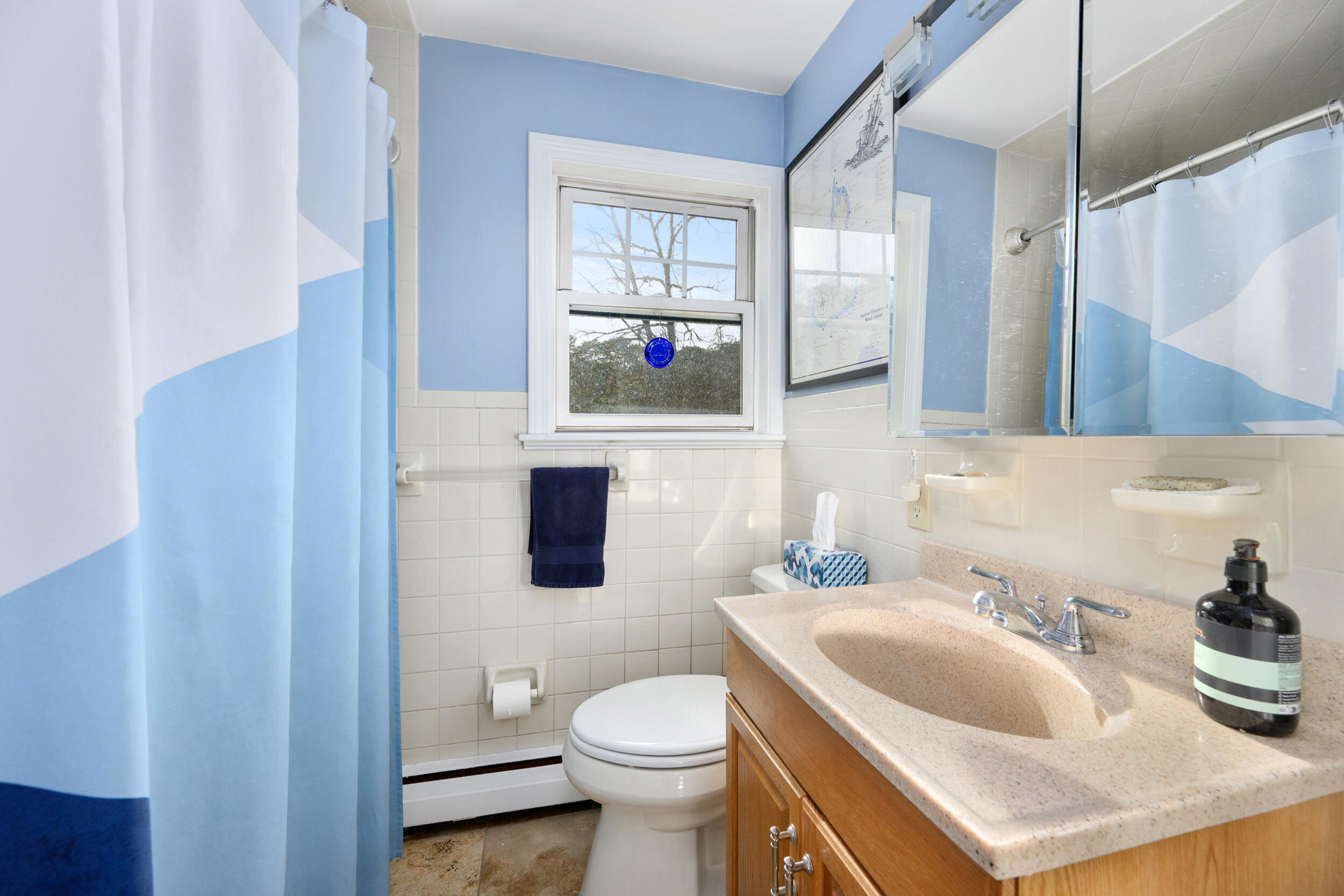 43 Chickadee Lane Centerville, MA 02632 - Photo 17 of 48 a bathroom with a sink a toilet and a mirror