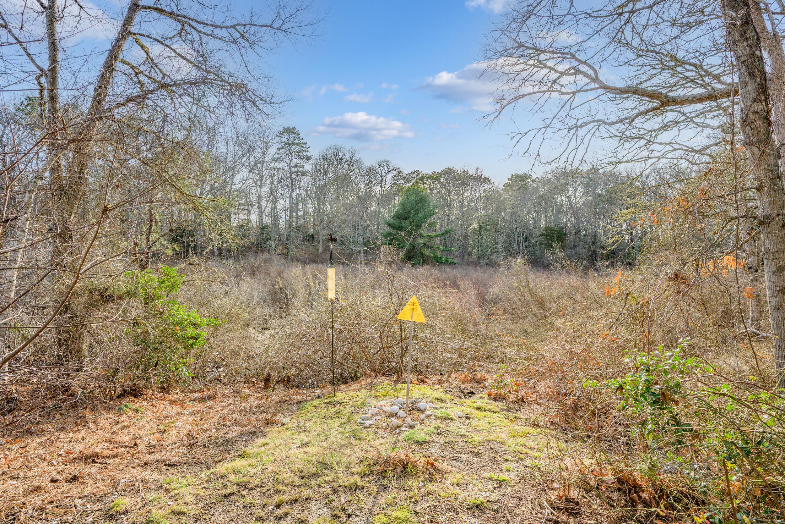 43 Chickadee Lane Centerville, MA 02632 - Photo 29 of 48 a view of a lake with a yard