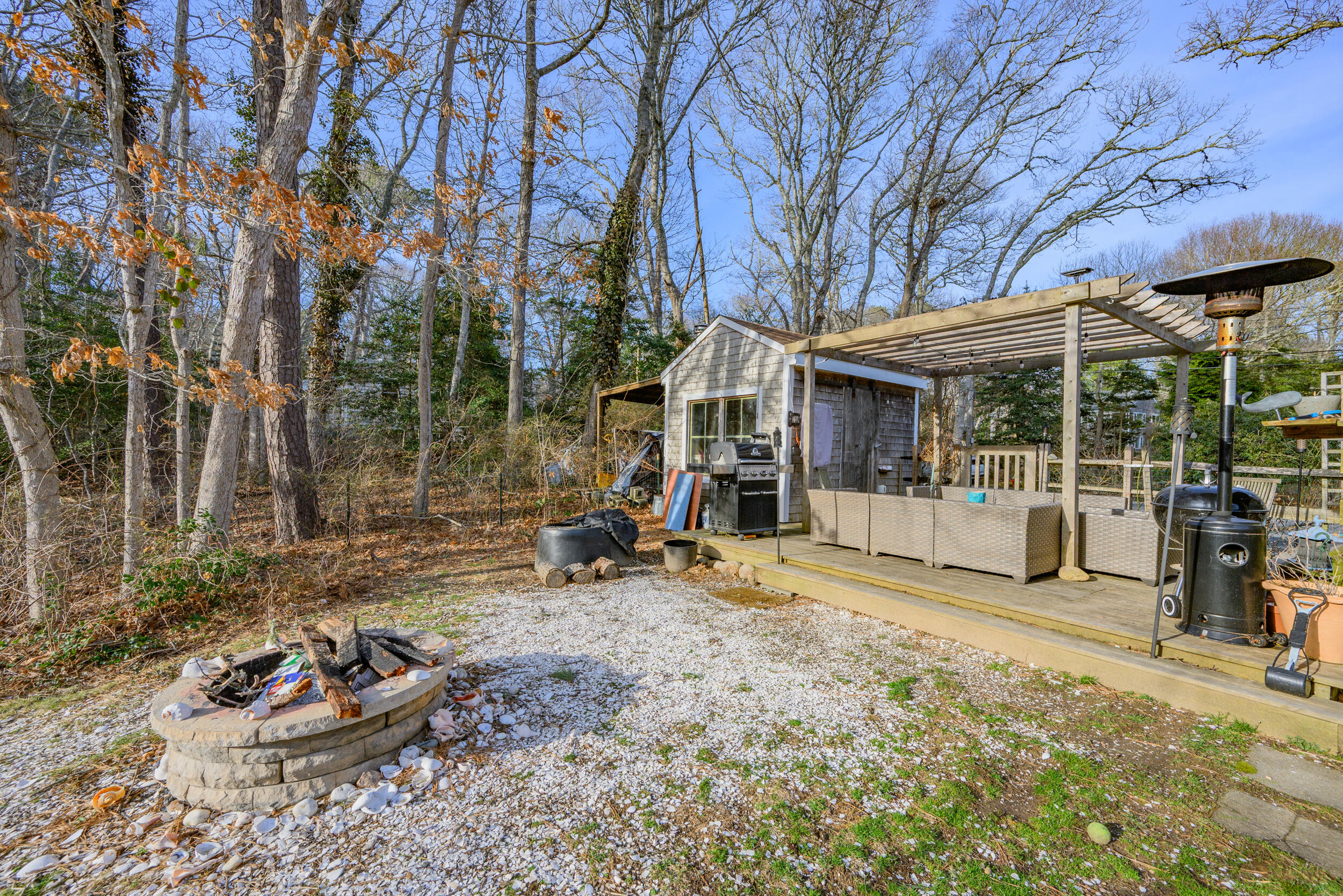 43 Chickadee Lane Centerville, MA 02632 - Photo 35 of 48 a view of a house with backyard