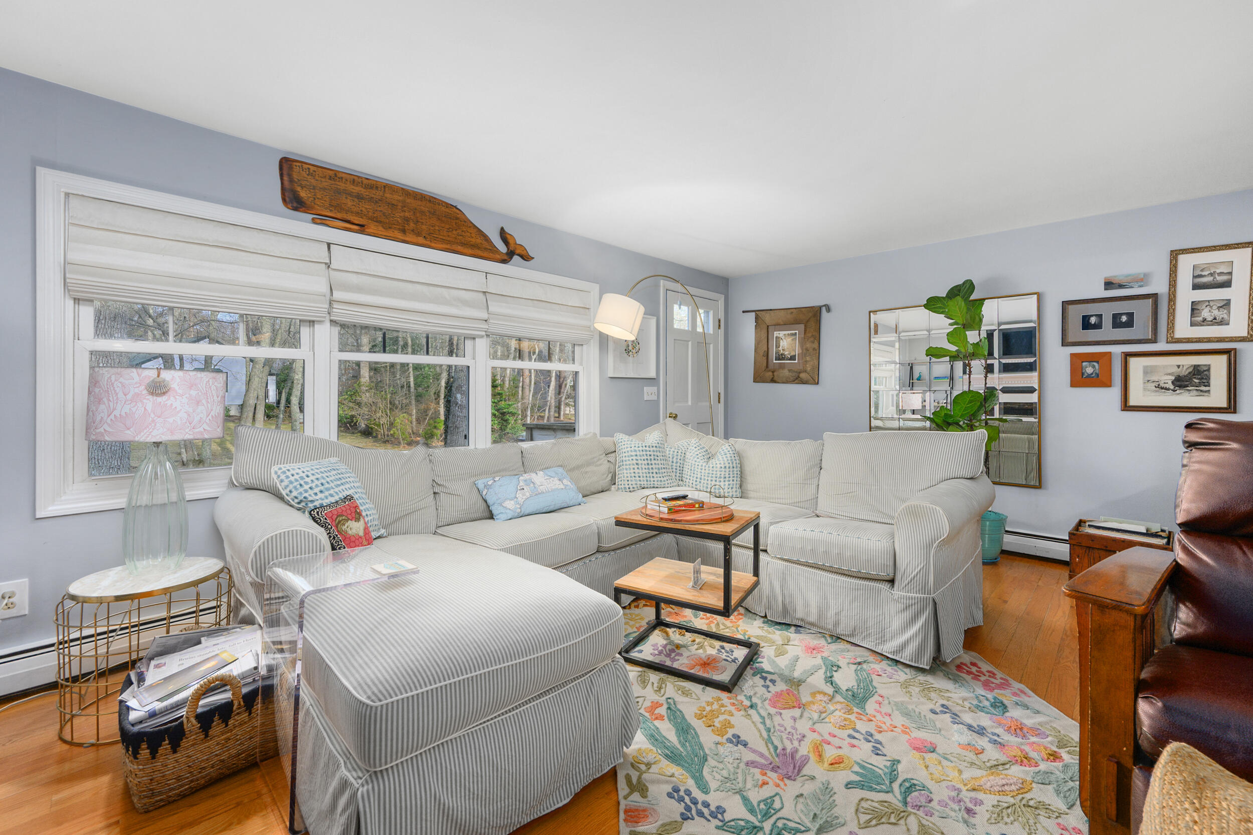 43 Chickadee Lane Centerville, MA 02632 - Photo 6 of 48 a living room with furniture and a wooden floor