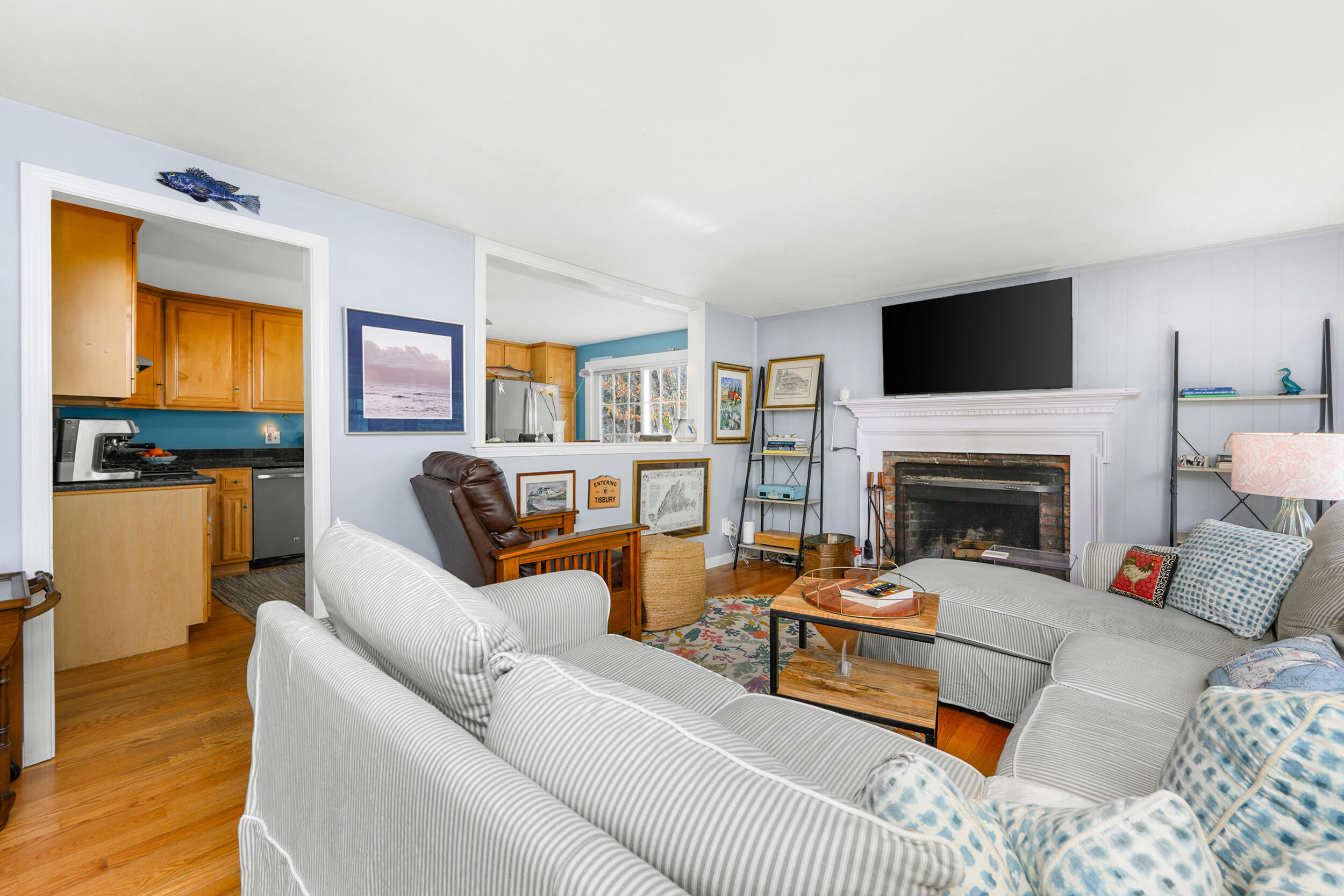 43 Chickadee Lane Centerville, MA 02632 - Photo 7 of 48 a living room with furniture fireplace and a flat screen tv