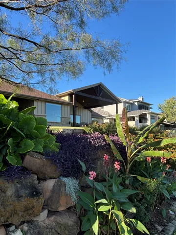 a view of a lake with a yard