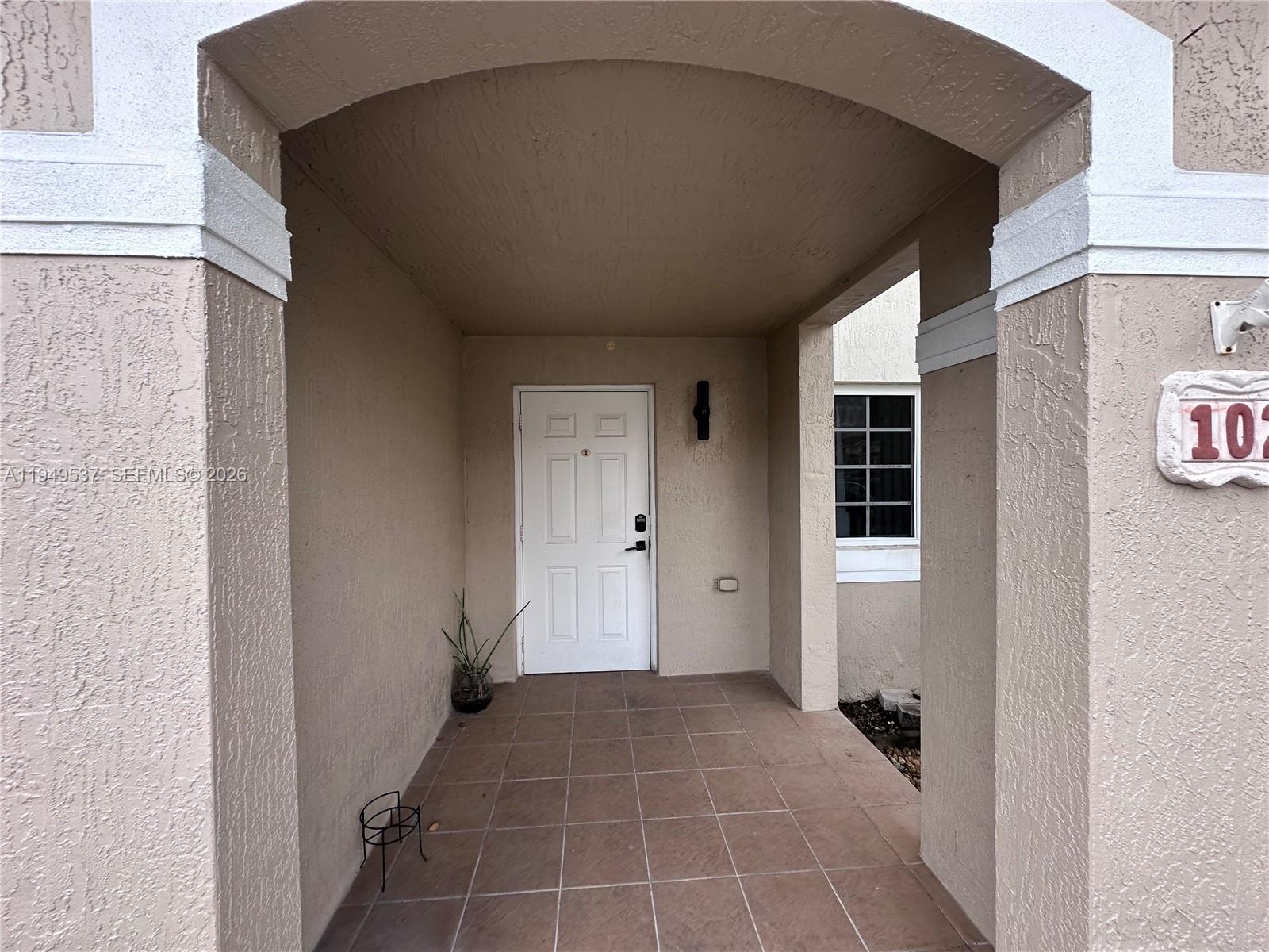 14036 Southwest 260th Street, Unit 102 Homestead, FL 33032 - Photo 2 of 17