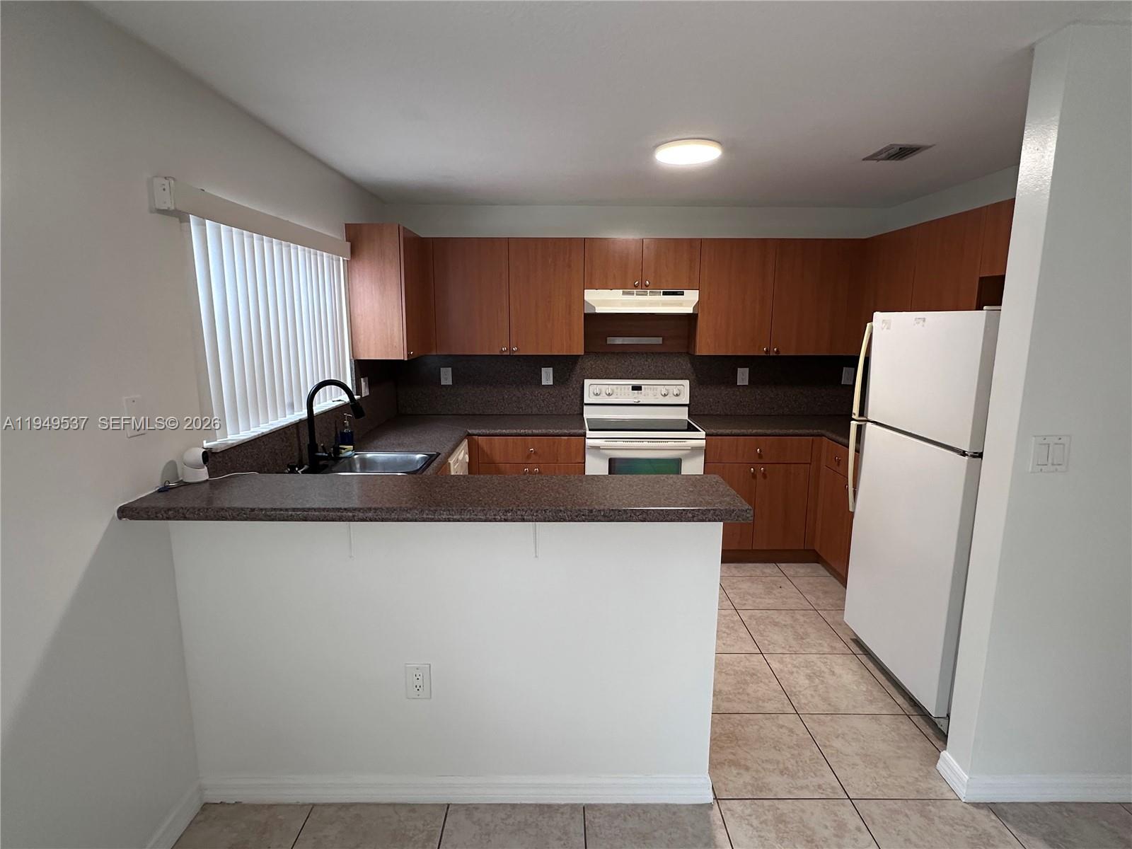 14036 Southwest 260th Street, Unit 102 Homestead, FL 33032 - Photo 5 of 17