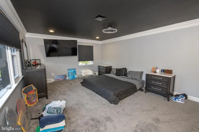 swimming pool view with a seating space