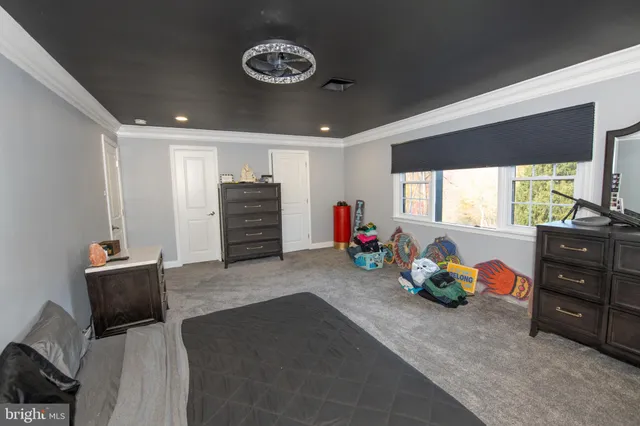 a view of a car parked in a yard