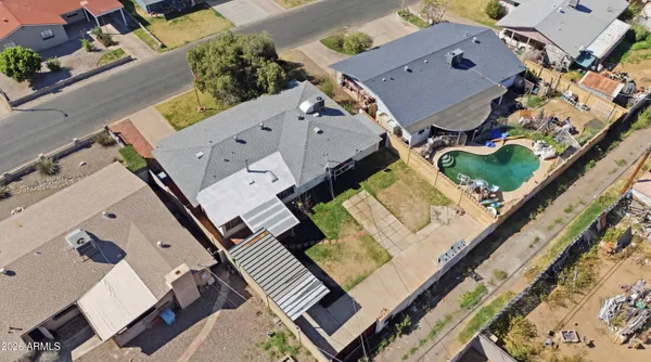 an aerial view of a house with roof deck