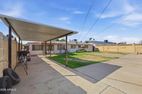 a view of a porch with a backyard