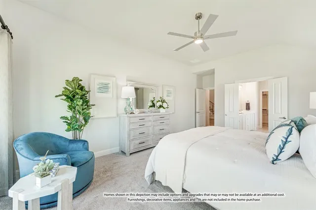 a bedroom with a bed dresser and a chair