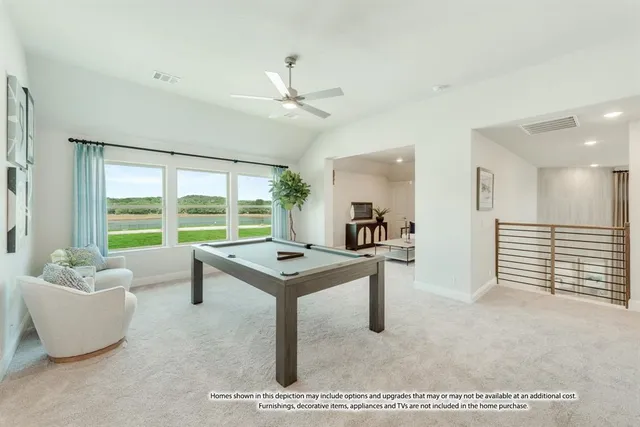 a view of a livingroom with furniture and window